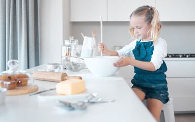 Kitchen baking, mixing and kid learning cooking, happy and preparing butter, flour or food ingredients. Girl, smile and fun for childhood, development and home hobby for snacks and cupcakes or muffin