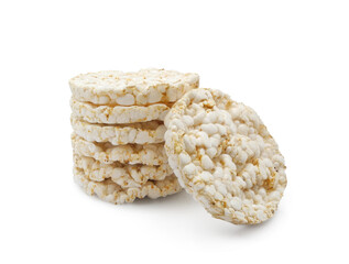 Stack of round puffed rice crispbread isolated on white background. Grain rice cakes for healthy snacks.