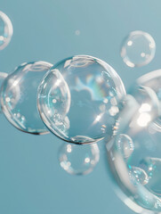 oil bubbles floating against a light background. The bubbles are semi-transparent with a reflective quality