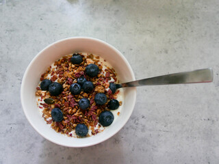 Yoghurt parfait. Breakfast bowl. Yoghurt, blueberries and muesli/granola. 
