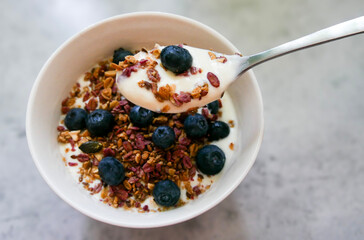 Yoghurt parfait. Breakfast bowl. Yoghurt, blueberries and muesli/granola. 