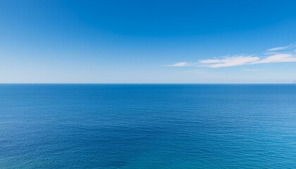 Scenic view of sea against blue sky during summer