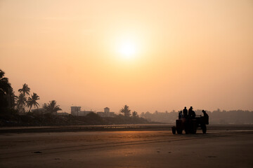 The setting sun at Murud beach. Murud is located 60 kms south of Alibag on the west coast of India.