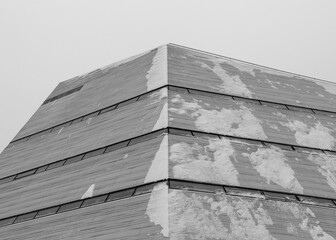 Snow-Covered Modern Building in Winter