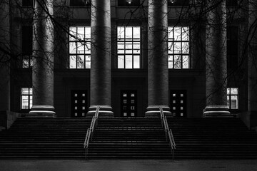 Grand Entrance of Neoclassical Building at Night