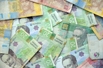 Processed collage of Ukrainian Hryvnia UAH bills banknotes texture. Background for banner