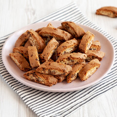 Homemade Cantuccini Cookies with Chocolate Chips on a Plate, side view.