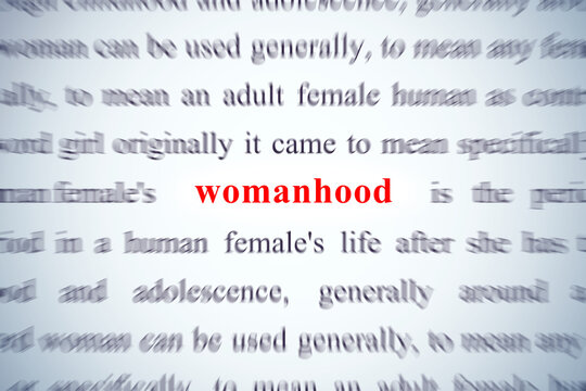 zoom on word womanhood