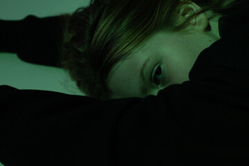 Portrait of a 10 year old girl. A serious portrait of a teenager, a vivid portrait of a growing teenager