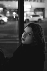 Portrait of a 10 year old girl. A serious portrait of a teenager, a vivid portrait of a growing teenager