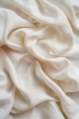Obraz premium Close-up of soft, white fabric with flowing, wavy textures, showcasing elegance and luxury. Perfect for backgrounds, design, and fashion concepts.