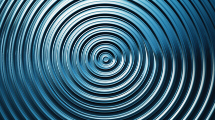 Naklejka premium Abstract close-up of concentric metallic circles with a blue hue, showcasing intricate texture and hypnotic patterns. Ideal for backgrounds and designs.
