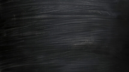 Fototapeta premium A blank chalkboard with visible chalk smudges, offering a perfect canvas for educational, business, or artistic concepts and ideas.