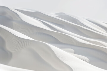 Obraz premium Stunning white sand dunes create a mesmerizing landscape with smooth, wavy patterns and soft shadows under clear skies.