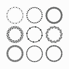 Black ink and isolated empty heart and leaves circle border decorative wreaths emblems, badges, and stamps design elements set