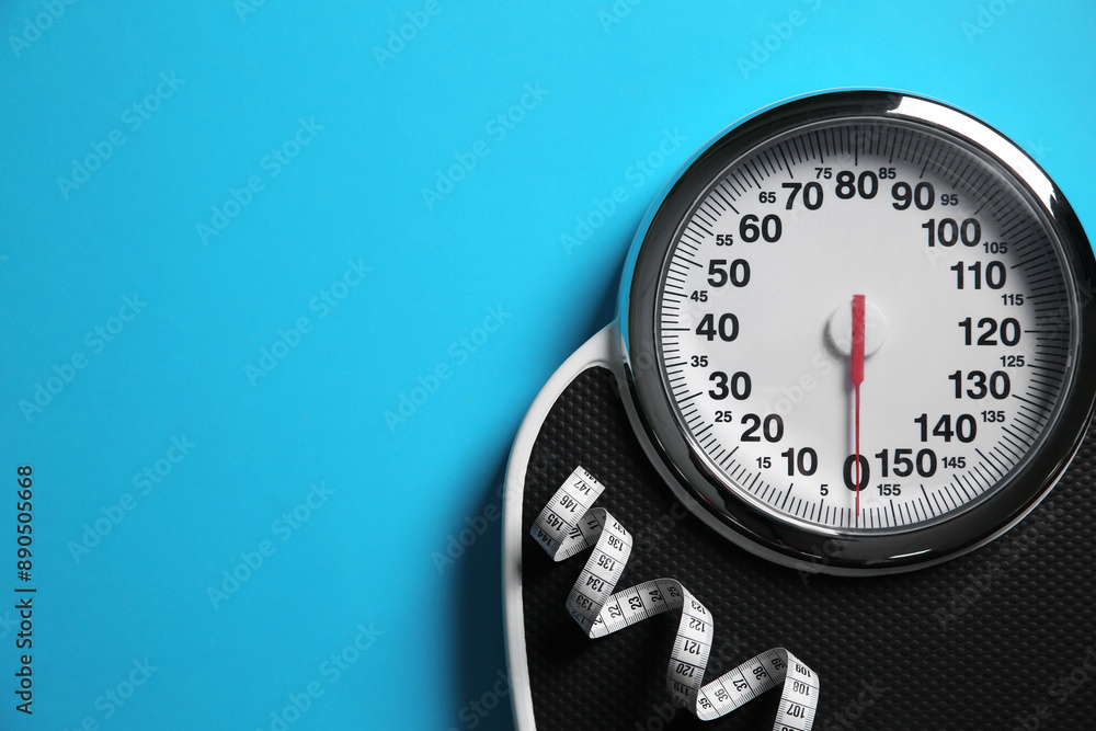 Poster Scale and measuring tape on light blue background, top view. Space for text