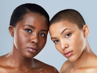 Skincare, face and portrait of black women in studio with natural, wellness and pigmentation routine. Health, beauty and friends with glow, smooth and dermatology facial treatment by gray background.