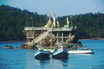 Small golden pagodas that are the symbol of Ngapali Beach is Myanmar's most famous beach.This beautiful beach Consisting of clean white sand beaches, blue sea water.It is located on the Bengal bay. © topten22photo
