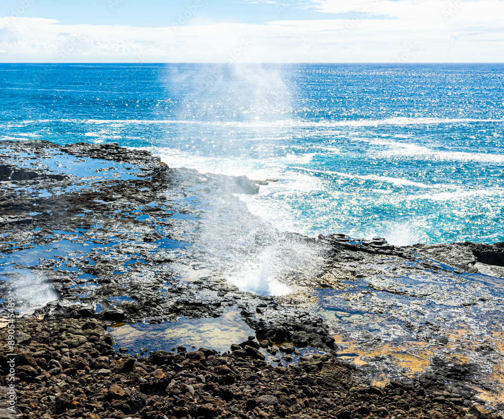 Wall mural Spouting Horn Blowhole Gushing Through Open Lava Tube, Spouting Horn Beach Park, Kauai, Hawaii, USA