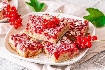 Pieces of summer pie with red currants