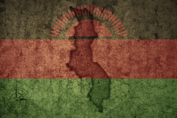 map and flag of malawi on a old vintage crack paper background .
