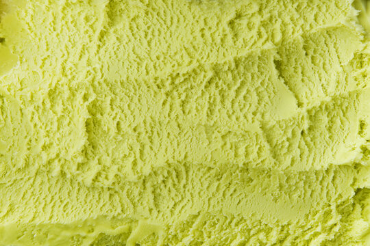 Pistachio ice cream detailed macro texture. Texture pistachio ice cream. Top view. Food concept. Blank for design.