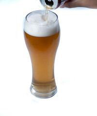 beer in large glass on white background