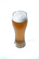 beer in large glass on white background