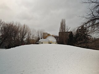 Observatory  in the park with snow