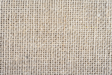 Fototapeta premium Abstract background, close up photo from a piece of Burlap fabric.