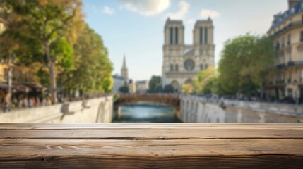 Fototapeta premium close up of rustic empty wooden table with blurred Notre-dame gothic cathedral church background