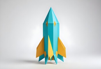 A colorful paper cut out rocket on a white studio background.
