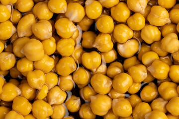 chickpeas porridge with honey during cooking