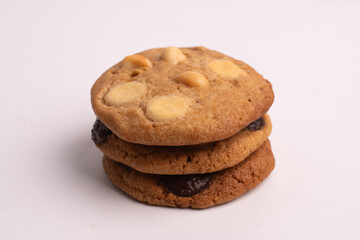 chocolate macadamia soft cookies on white background