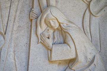 Mary Magdalene at the foot of the cross. Jesus dies on the cross – Station XII of the Way of the...