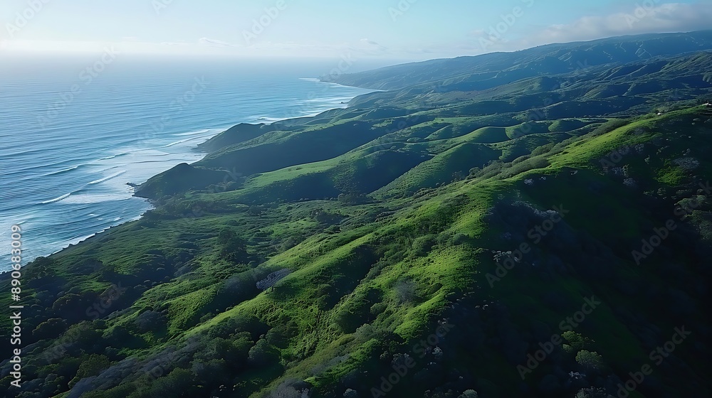 Poster aerial view capturing rolling hills extending into the horizon and beyond