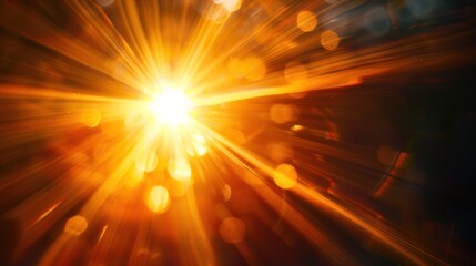 Abstract yellow sun is shining bright through a blurry background