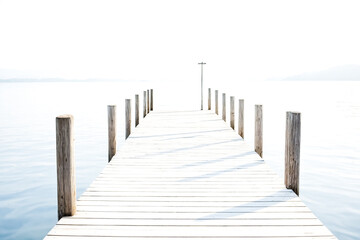 Obraz premium Wooden Dock Leading Out to Calm Water