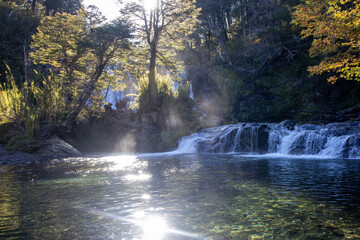 waterfall in autumn forest
