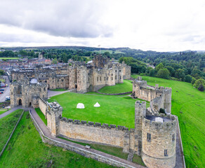 Naklejka premium Alnwick, Northumberland, UK, June 18, 2024; aerial view of Alnwick Castle, Alnwick, Northumberland, England, UK.