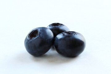 fresh blueberries or bilberry fruit isolated on white background,copy space