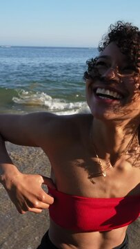 Young Woman Laughing at the beach