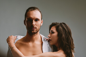 Woman expresses desire, man remains composed, reflective