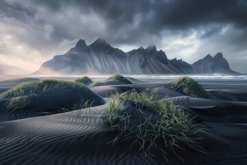 A desolate landscape with a mountain range in the background