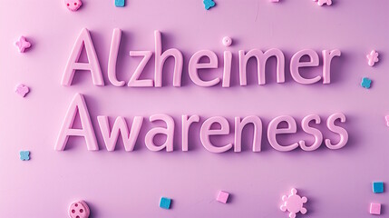 Pink background with the words "Alzheimer Awareness" surrounded by small decorative elements. Concept for awareness campaigns and educational outreach in Alzheimer's disease