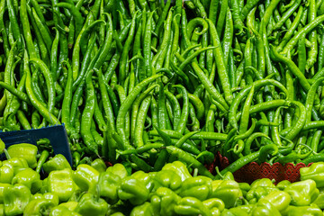 Fresh green chillies in the interior of the local Turkish market.
