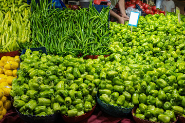 Fresh green chillies in the interior of the local Turkish market.