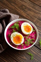Homemade cold summer beet soup with cucumbers, dill and egg