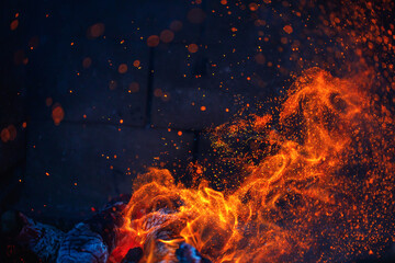 abstract fire in fireplace with sparks