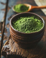 Organic matcha green tea powder in a wooden bowl.